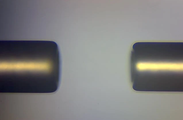Two gold-coated fiber-cavity mirrors assembled face to face to form an optical microcavity.
